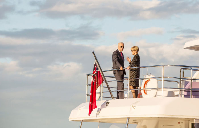 US Vice President Joe Biden left and Australian Foreign Minister Julie Bishop ride a boat during a cruise on Sydney Harbour on Tuesday. — AFP