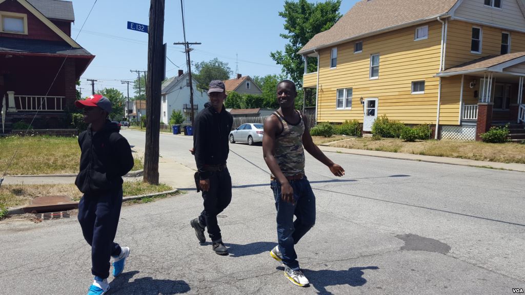 Unidentified passersby on a street in Mount Pleassant