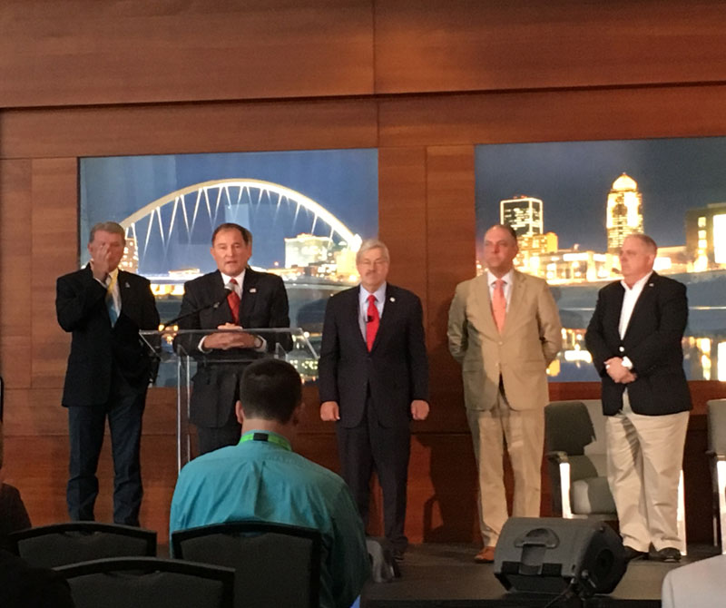 Utah Governor Gary Herbert speaks at a news conference for the National Governors Association meeting. Iowa Governor Terry Branstad is to his left