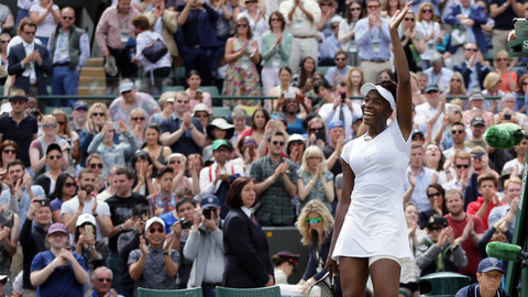 Venus Williams celebrates after beating Yaroslava Shvedova in the Wimbledon quarters Tuesday