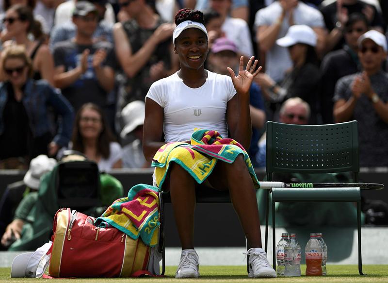 Venus Williams celebrates winning her match against Kazakhstan's Yaroslava Shvedova