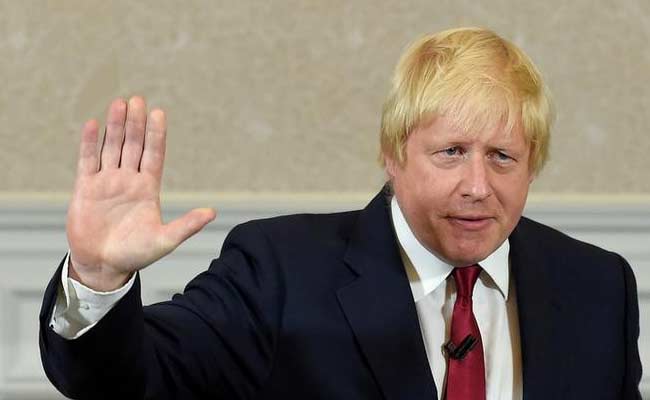 Vote Leave campaign leader Boris Johnson waves as he finishes delivering his speech in London Britain