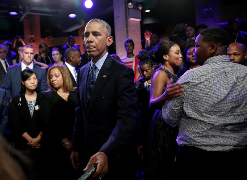 President Obama meets members of the audience including Cameron Sterling right son of Alton Sterling who was shot and killed by white police officers in Louisiana after taking part in a televised town hall about trust and safety