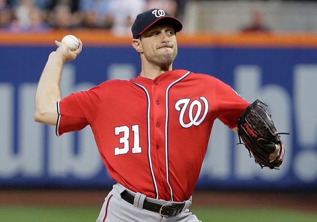 Washington Nationals starting pitcher Max Scherzer delivers against the New York Mets during the first inning of a baseball game Saturday