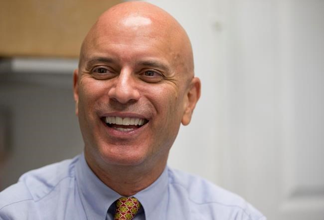 Tim Canova smiles as he speaks during an interview at his campaign headquarters in Hollywood Fla. The Democratic National Convention in Philadelphia this week is fertile fundraising ground for one Florida congress