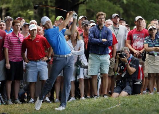 Jordan Spieth hits from the rough on the