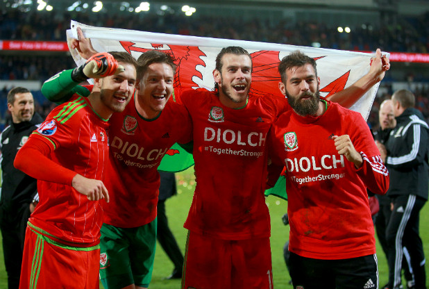 Welsh players celebrate qualification