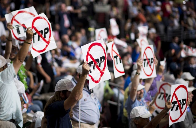 Marching, sitting, burning protests continue to roil DNC