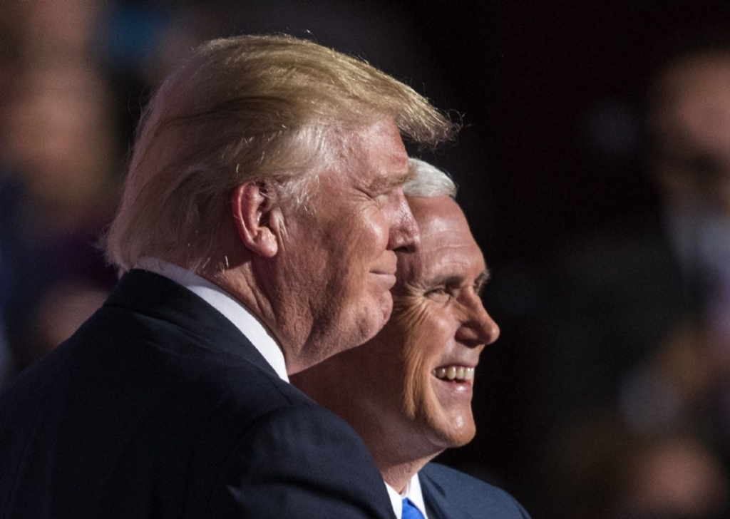 Donald Trump joins Mike Pence on stage after the Indiana governor accepted the party's vice-presidential nomination at the Republican National Convention in Cleveland July 20