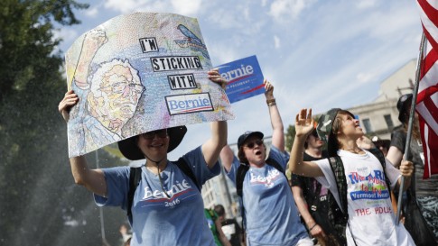 Supporters of Sen. Bernie Sanders I-Vt. march during a protest in downtown Philadelphia on Sunday