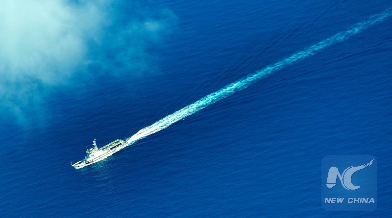 25 2015 from a seaplane of Hainan Maritime Safety Administration shows cruise vessel Haixun 1103 heading to the Yacheng 13-1 drilling rig during a patrol in South China Sea. Xinhua