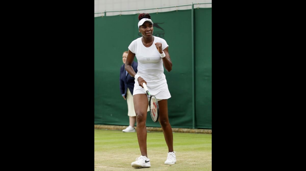 Venus Williams of the U.S celebrates after beating Maria Sakkari of Greece in their women's singles match on day four of the Wimbledon Tennis Championships in London Thursday