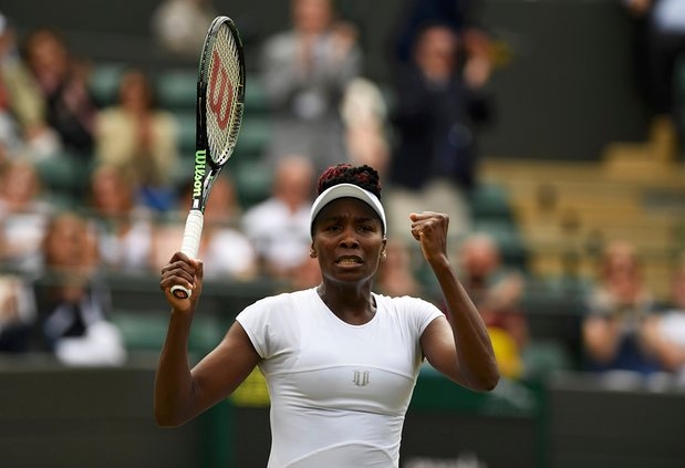 Angelique Kerber shines as she beats Simona Halep to reach Wimbledon final four