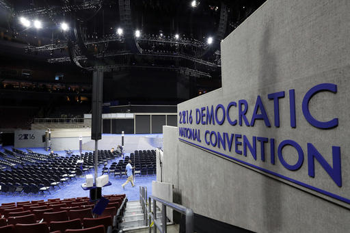 Work continues inside the convention hall before the Democratic National Convention Saturday