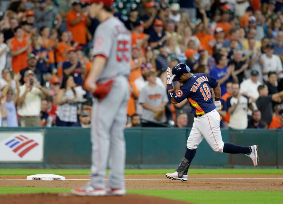 Houston Astros Luis Valbuena rounds the bases on his home run against the Los Angeles Angels during the first inning at Minute Maid Park Sunday