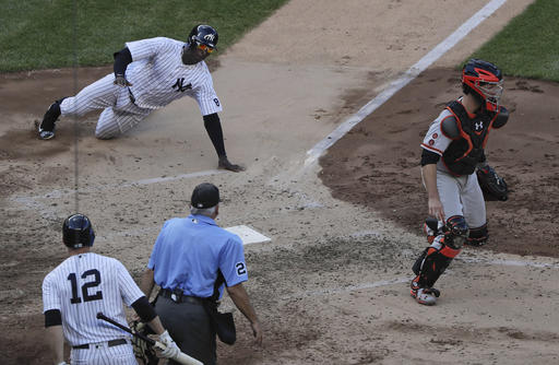 New York Yankees Didi Gregorius left scores during the fourth inning of a baseball game Saturday