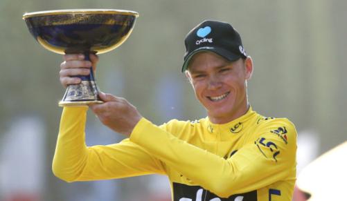 Yellow jersey leader and overall winner Team Sky rider Chris Froome of Britain reacts on the podium