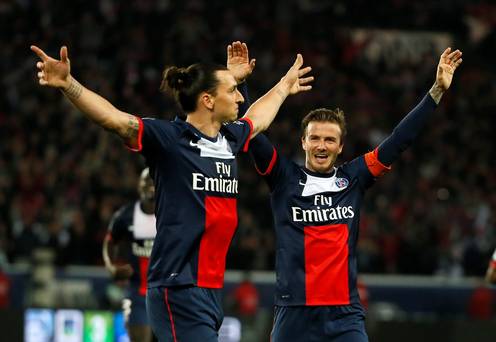 Zlatan Ibrahimovic celebrates with David Beckham during their time at Paris Saint-Germain