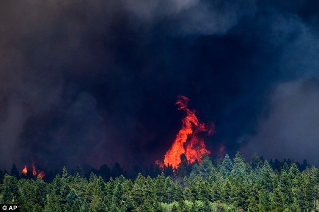 Investigators determined the origin of the fire was an ad hoc campsite near the Peak-to Peak Highway and Cold Springs Road. Above the fire continues to burn on Sunday