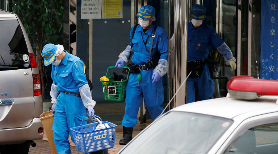 Police officers investigate at a facility for the disabled where a deadly attack by a knife-wielding man took place in Sagamihara Kanagawa prefecture Japan