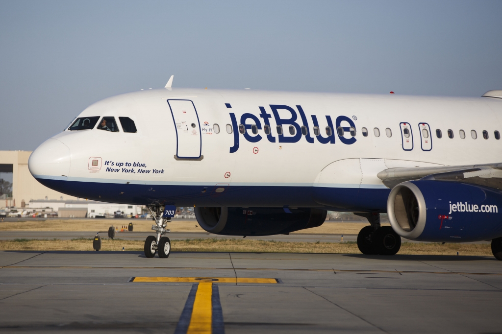 A Jet Blue Airways Corp. Airbus Group SE A320 aircraft taxis to the gate on the tarmac at Long Beach Airport in Long Beach California