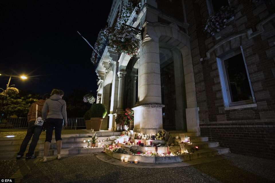 Makeshift memorial for the late priest