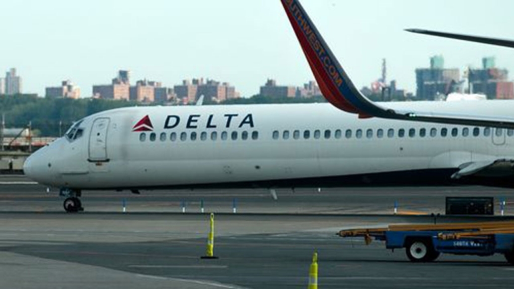 A Delta jet taxis at New York's La Guardia Airport on Aug. 8 2016