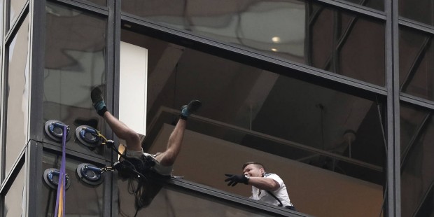 Man scales part of Trump Tower in New York City using suction cups