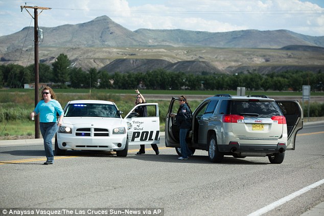 A New Mexico cop was shot dead by the passenger of a car he pulled over for a routine traffic stop