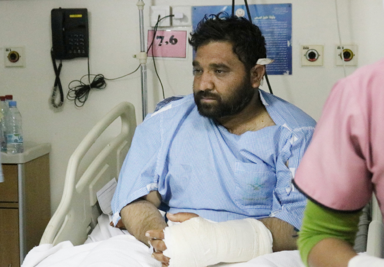 A Pakistani worker wounded in a missile attack receiving treatment in King Khaled Hospital in Najran. — SG