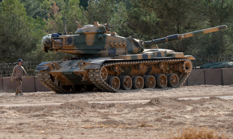 A Turkish tank stationed near the Syrian border in Karkamis Turkey Monday Aug. 29 2016