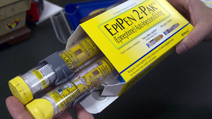 A US drug company has been forced to reduce the cost of its emergency Epi Pen for some patients