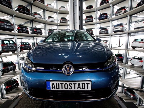 A Volkswagen Golf car is loaded in a delivery tower at the plant of German carmaker in Wolfsburg Germany