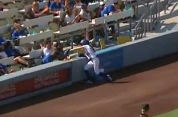 A ballgirl saved a fan from getting hit in the face with a quick catch of a 108 mph line drive