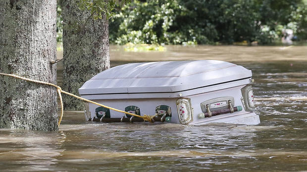 A casket is seen floating in flood waters in Ascension Parish La. on Aug. 15. REUTERS  Jonathan Bachman