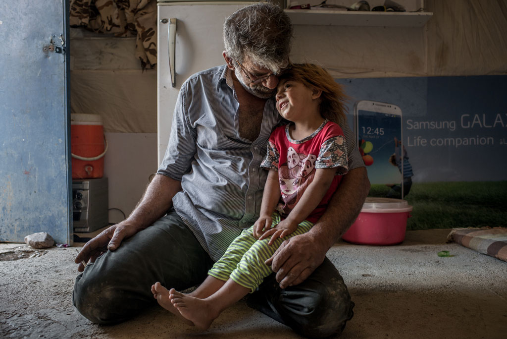 A displaced family from Mosul living at Baharka Camp on the outskirts of Erbil Iraq