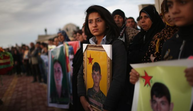 A funeral for victims of ISIS car bombs in November 2015