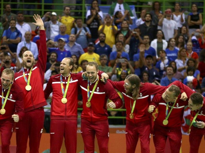 A jubilant Denmark men's team after the victory