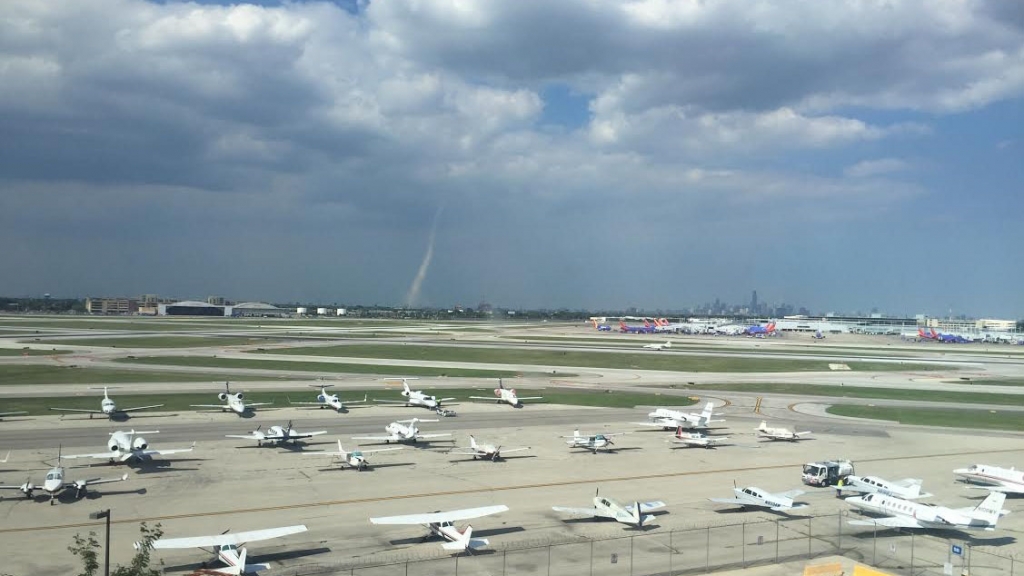 A landspout tornado spotted about four miles north of Midway International Airport on Aug. 9 2016