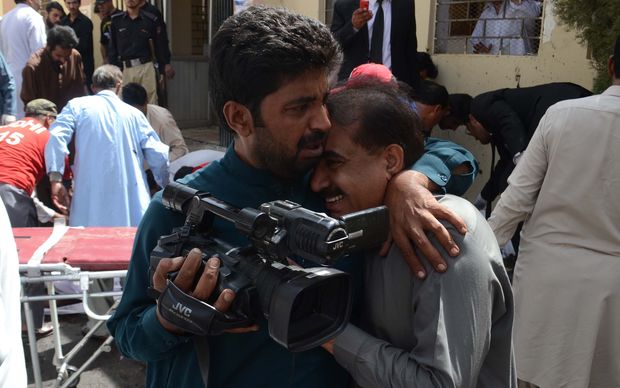 A man cries after blast in front of a hospital in Quetta Pakistan