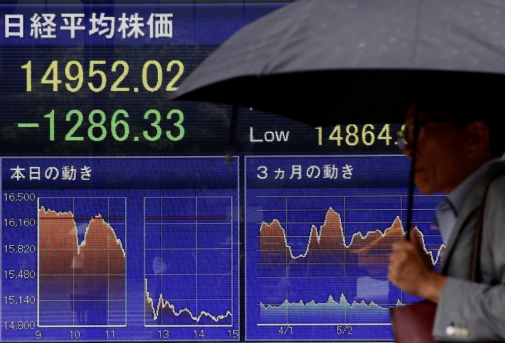 Most Asia stocks slide on Fed officials&#039 rate comments dollar firms