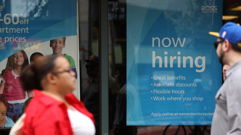 A''now hiring sign is posted outside of a Ross Dress for Less store on July 8 in San Francisco California