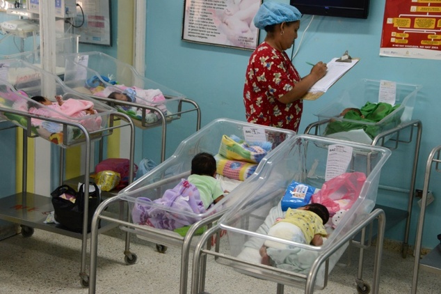 A nurse takes care of babies born with microcephaly in Choluteca Honduras