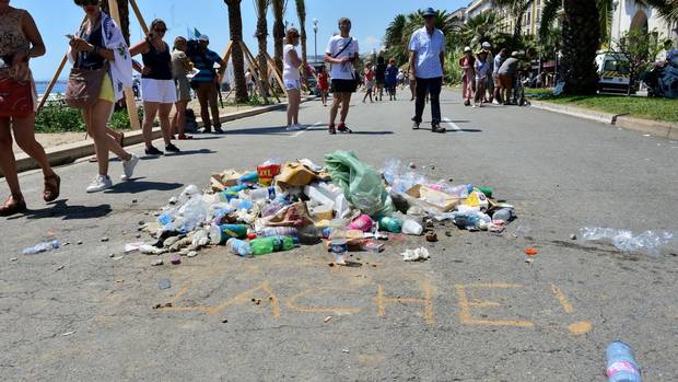 A pile of rubbish left to signify the spot where the lorry stopped and the terrorist driver was killed on the Promenade des Anglais in Nice France