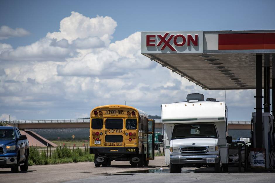 1/1


A school bus stops next to a roadside Exxon gas station outside Aurora N.M