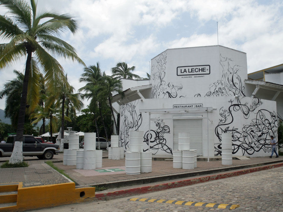 The entrance of the restaurant'La Leche stands closed after armed men abducted as many as 16 people who were dining in the upscale restaurant in Puerto Vallarta Mexico Monday Aug. 15 2016