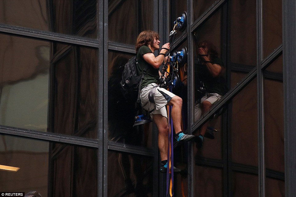 A stuntman is trying to scale the 58-story Trump Tower in New York City using just suction cups