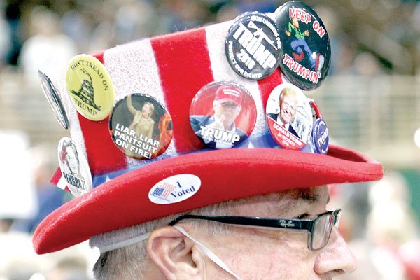 A supporter of Republican presidential candidate Donald Trump attends a campaign rally at Silver Spurs Arena