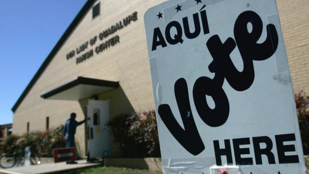 A voter enters a polling station to cast his vote in the Texas Primary in Seguin Texas