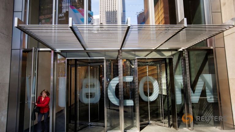 A woman exits the Viacom Inc. headquarters in New York